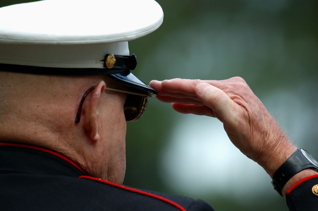 The Annual Patriot Festival will include a salute to veterans. An Old marine salutes during a ceremony